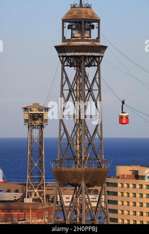 BARCELONA, SPAIN - OCTOBER 6, 2021: Towers of Port Vell Aerial Tramway (Teleferic del Port). Barcelona is the 2nd largest city in Spain. Stock Photo