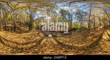 full seamless hdri 360 panorama near mountain stream in tree-covered ravine in autumn forest in sunny day equirectangular spherical projection. ready Stock Photo