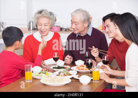 Families having a reunion dinner on New Year's Day Stock Photo