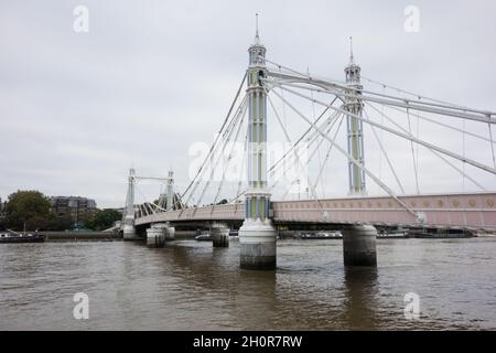 Rowland Mason Ordish and Joseph Bazalgette's Albert Bridge (aka The Trembling Lady) on the River Thames at Battersea, London, England, UK Stock Photo