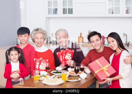 Families having a reunion dinner on New Year's Day Stock Photo