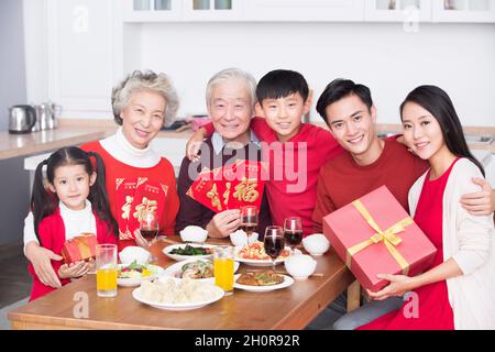 Families having a reunion dinner on New Year's Day Stock Photo