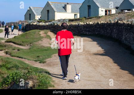 Newquay,Cornwall,18th October 2020,People enjoying the warm weather on a lovely Sunny Day in Fistral Beach, Cornwall. The beach is famous as People travel from all over the country to ride the famous surf.Credit: Keith Larby/Alamy Live News Stock Photo