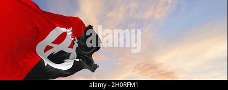 flag of Anarchist with A symbol  at cloudy sky background on sunset, panoramic view. Anarchism symbol. copy space for wide banner. 3d illustration Stock Photo