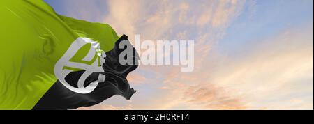 flag of Geo-Anarchist  at cloudy sky background on sunset, panoramic view. Anarchism symbol. copy space for wide banner. 3d illustration Stock Photo