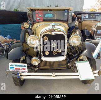 AVELLANEDA - BUENOS AIRES, ARGENTINA - Sep 27, 2021: shot of an old yellow Ford Model A Phaeton 1929. Front view. Expo Fierros 2021 classic car show Stock Photo