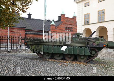 The Stridsvagn 103 (Strv 103), also known as the S-Tank outside the Swedish Army Museum in Stockholm, Sweden, during Sunday afternoon. The Swedish Army Museum (Swedish: Armémuseum) is a museum of military history located in the district of Östermalm in Stockholm. Stock Photo