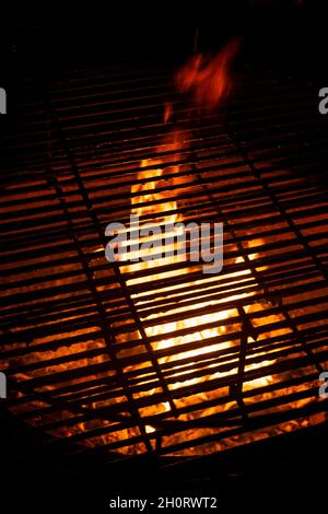 selective focus, fire texture, grill grill with burning coals. background for menus and ads Stock Photo