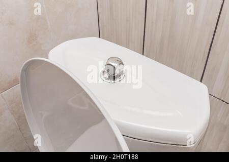 Toilet barrel water flush tank in the toilet drain or bathroom. Stock Photo