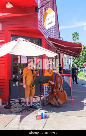 NEW ORLEANS, LA, USA - OCTOBER 9, 2021: Closeup of jazz duo performing at Bywater Bakery in New Orleans Stock Photo