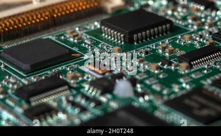 printed circuit board with surface mounted passive and active circuit components close up Stock Photo