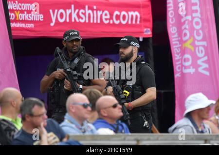 Armed police patrol the ground during the first day of the second Investec Test Match at Headingley Cricket Ground, Leeds, Yorkshire Stock Photo