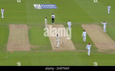 West Indies' Devendra Bishoo celebrates taking the wicket of England's Joe Root during the first day of the second Investec Test Match at Headingley Cricket Ground, Leeds, Yorkshire