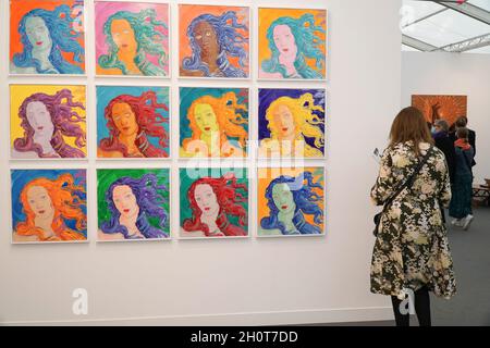 London, UK, 14 October 2021: Frieze art fair opens in London with contemporary art from around the world. Artists Nick and Rob Turner presented 'Twelve Robot Paintings, Birth of Venus, After Botticelli, after Warhol.' Each panel took 10 hours and 1,902 strokes to paint. Anna Watson/Alamy Live News Stock Photo