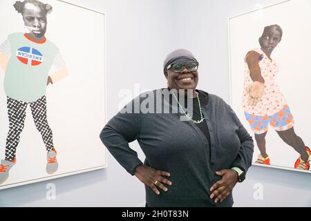 London, UK, 14 October 2021: Frieze art fair opens in London with contemporary art from around the world. American artist Deborah Roberts has a presentation of her distinctive style of paintings using collage and mixed media. Anna Watson/Alamy Live News