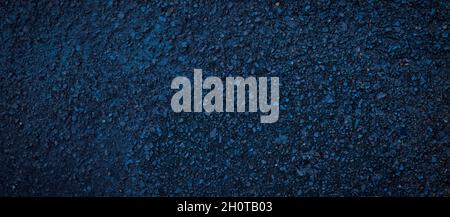 Dark blue concrete rough surface, dark noble background, grunge texture. Stock Photo