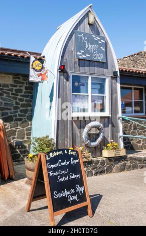 Craster village L. Robson & Sons Ltd The Kipper Shop traditional oak smoking of kippers and salmon Craster Village Northumberland England UK GB Stock Photo