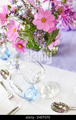 close up from above of table place setting at formal dinner party Stock Photo