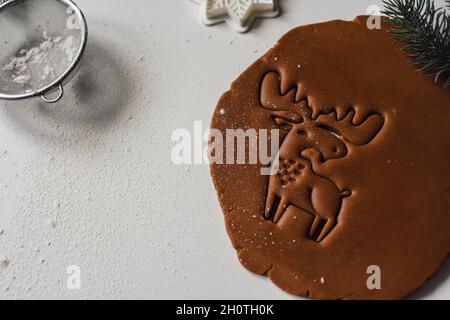 Beautiful deer carved on raw ginger dough Concept of Stock Photo