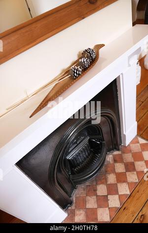 close up view of filreplace and mantlepiece with tiled floor Stock Photo