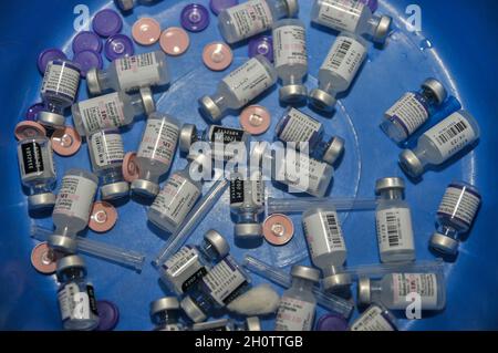 Sylhet, Bangladesh. 14th Oct, 2021. Empty vials of the Pfizer-BioNTech Covid-19 Vaccine at the M A G Osmani medical college & hospital vaccination center. Credit: Majority World CIC/Alamy Live News Stock Photo