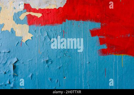 stone wall with old blue and red paint. background grunge. High quality photo Stock Photo