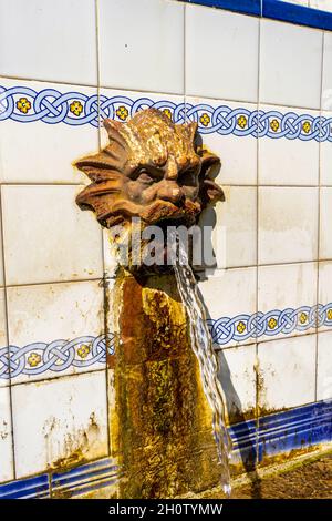 Water fountain tile bell lions. Ancient concept Stock Photo