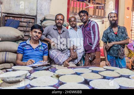 KHULNA, BANGLADESH - NOVEMBER 12, 2016: Local sellers at a market in Khulna, Bangladesh Stock Photo