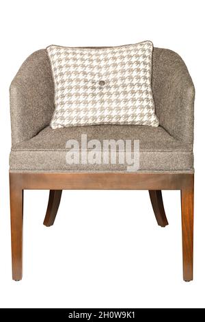 Armchair upholstered in gray-brown textile fabric with white quilted cushion. Isolated on white background. Stock Photo