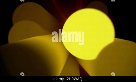 Close-up of motion of abstract blur cylinder shapes with illumination. Black background Stock Photo