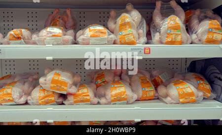 Glasgow, Scotland, UK 14th October, 2021. Supermarket shelves and supply saw variable stock in sainsburys tonight as different sections were either empty or overflowing. Fresh chickens were in abundance.  Credit Gerard Ferry/Alamy Live News Stock Photo