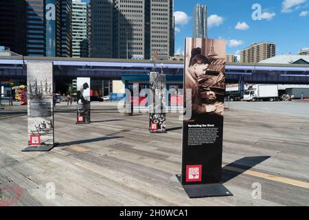 The South Street Seaport Museum has erected a free exhibition on Pier 16 that celebrates the people who lived and worked in the South Street Seaport. Stock Photo