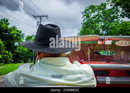 Havana, Cuba, July 2019, close up of the back of a taxi driver with a hat driving Stock Photo