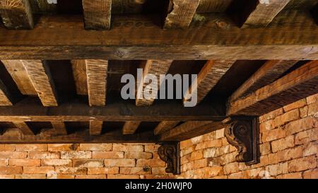 wooden ceiling joists with massive beams in a house in a traditional old style Stock Photo