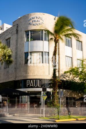 Miami Beach, FL, USA - October 14, 2021: New York Film Academy and Paul Restaurant Miami Beach Lincoln Road Mall. Long exposure to blur people and pas Stock Photo