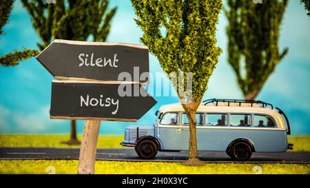 Street Sign the Direction Way to Silent versus Noisy Stock Photo