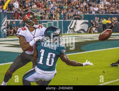 Philadelphia, Pennsylvania, USA. 14th Oct, 2021. Tampa Bay's cornerback JAMEL DEAN, #35, is called for pass interference as the Eagles JALEN REAGOR reaches for the ball during an NFL football game between the Philadelphia Eagles and the Tampa Bay Buccaneers at Lincoln Financial Field in Philadelphia, Pennsylvania. Tampa Bay won 28-22. (Credit Image: © Jim Z. Rider/ZUMA Press Wire) Stock Photo