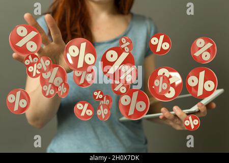 Person presenting the virtual projection of percent signs - sale or discount concept Stock Photo