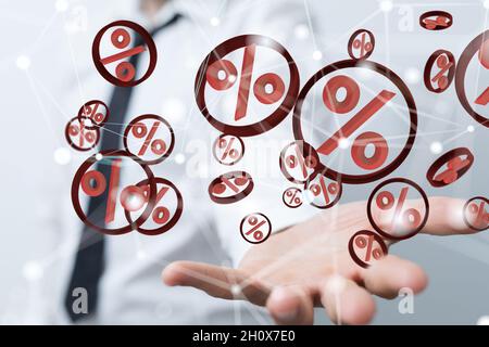 Person presenting the virtual projection of percent signs - sale or discount concept Stock Photo