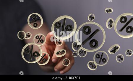 Person presenting the virtual projection of percent signs - sale or discount concept Stock Photo