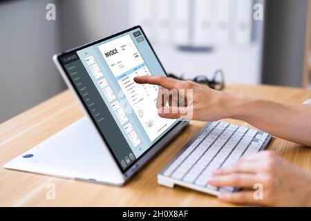 E Invoice On Laptop. Online Electronic Bill Management Stock Photo