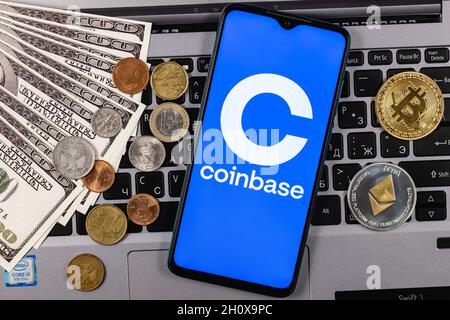 Coinbase, is an American company that operates a cryptocurrency exchange platform. Coinbase logo on smartphone screen. Stock Photo