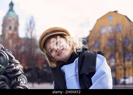 Smiling girl looking away Stock Photo