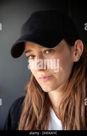 Portrait of woman looking at camera Stock Photo