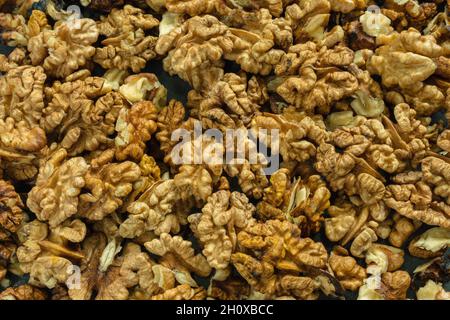 Top view of peeled walnuts. Close-up. Background image Stock Photo