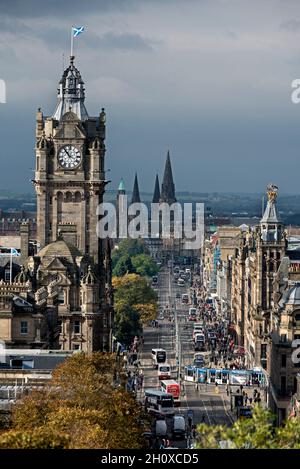 View of the clocktower on the Balmoral Hotel and along Princes Street on a sunny autumn morning. Stock Photo