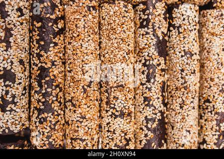 Cooking marshmallow from fruit puree - thin dried leaves and dessert from them - sesame nuts and dried fruits Stock Photo