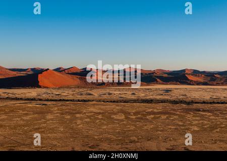 An aerial view of red sand dunes in the Namib desert. Namib Naukluft Park, Namib Desert, Namibia. Stock Photo