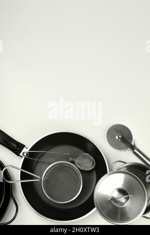 Set of different kitchen utensil on white background. Stock Photo