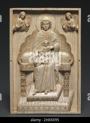 Ivory Plaque with Enthroned Mother of God ('The Stroganoff Ivory'), 950–1025. Byzantium, Constantinople, Byzantine period. Ivory; overall: 25.3 x 17.2 x 1.8 cm (9 15/16 x 6 3/4 x 11/16 in.).  The Mother of God is seated on a lavishly carved, high-backed throne. Two angels hover above, drawing attention to the Christ child poised in her lap. Representations of the enthroned Virgin and Child have a long tradition in Byzantine art, stretching back as far as the 6th century. With one hand raised in blessing, the other holding a scroll, Christ is portrayed here as an emotionless and supernatural ch Stock Photo